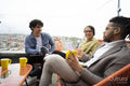 Business people having meeting on office terrace