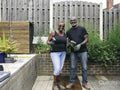 Couple with construction tools on patio