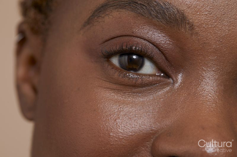 Close-up of smiling woman's eye
