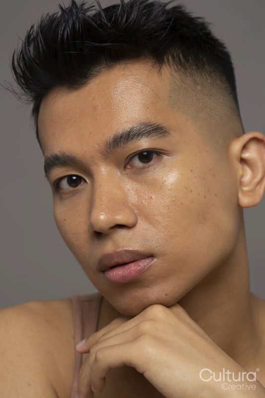 Studio portrait of pensive person