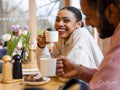 Young man and woman drinking coffee