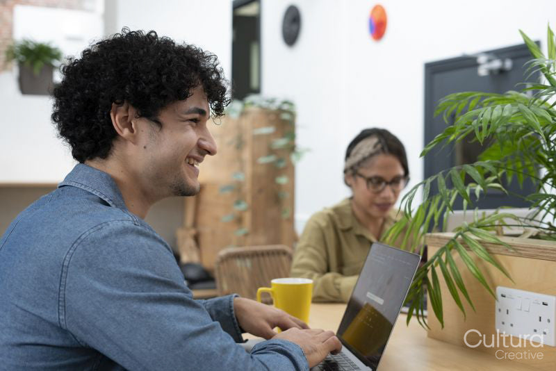 Creative professionals working in office