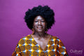 Studio portrait of mature woman with big hair