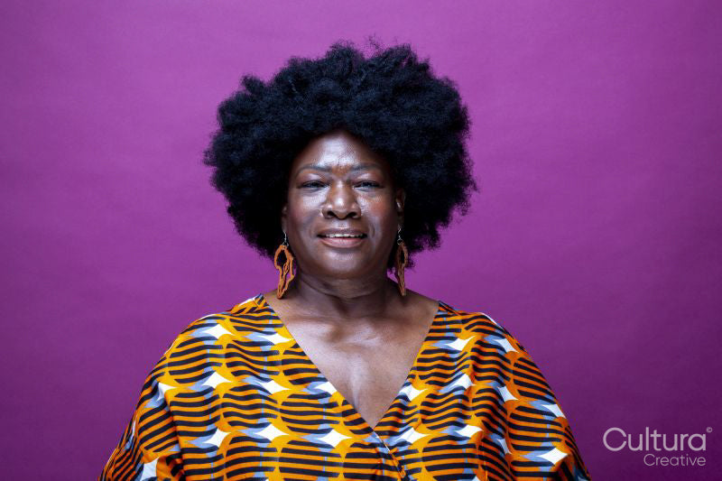 Studio portrait of mature woman with big hair