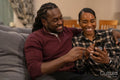 Mid adult couple sitting on sofa