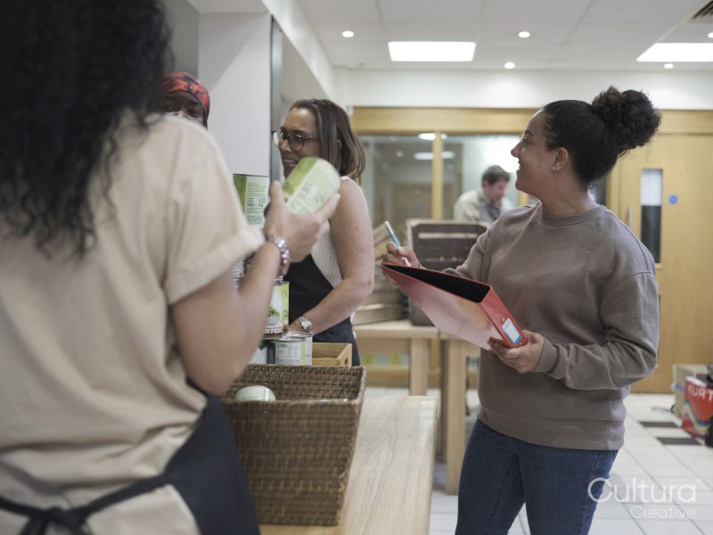 Volunteers working in community food center