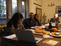 Family having video call during Thanksgiving dinner