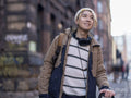 Portrait of smiling man in city