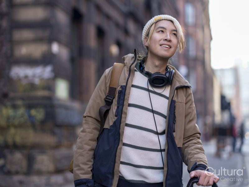 Portrait of smiling man in city