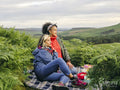 Female hikers having picnic