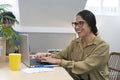 Smiling businesswoman working in office