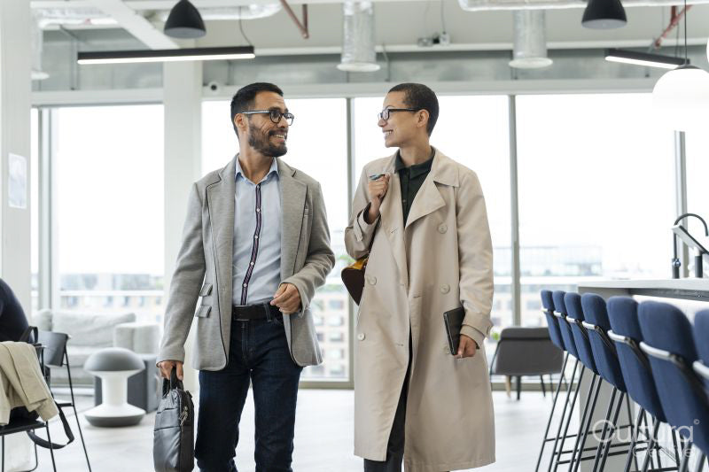 Office workers walking together in hallway