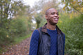 Man looking at landscape during hike at autumn