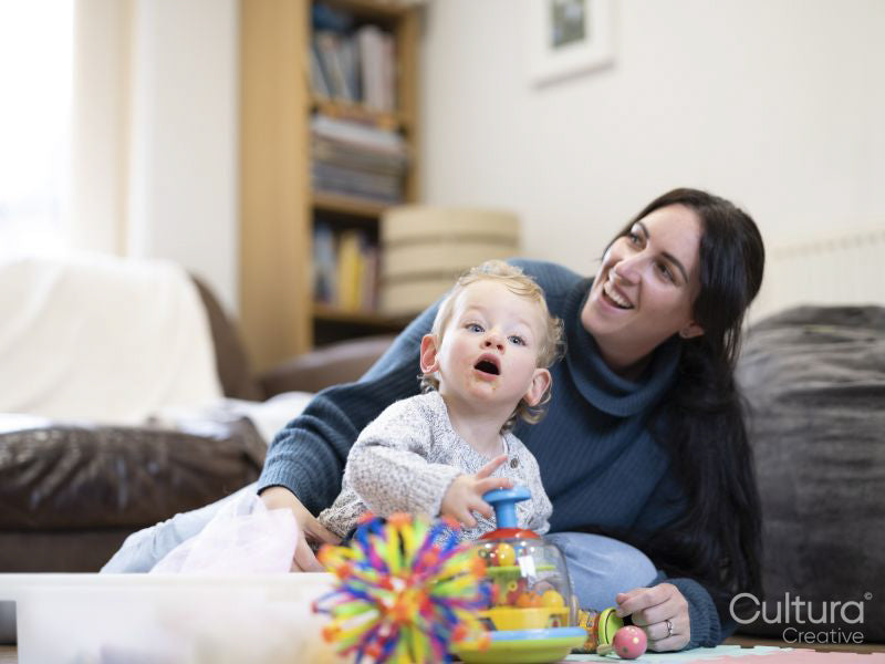 Mother and son playing at home