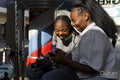 Young female friends having fun on merry-go-round