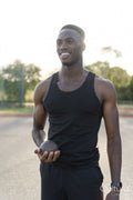 Portrait of athlete holding shot put