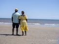 Mature couple standing on beach