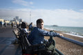 Portrait of disabled teenage boy by the sea