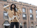 Young woman posing for portrait in urban setting