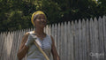 Senior woman working in backyard