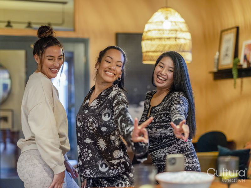 Friends taking selfie during girls night at home