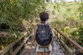 Indonesia, Bali, Female tourist walking on footbridge