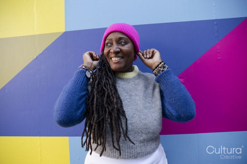 Portrait of beautiful woman on colorful background