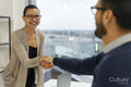 Business people greeting in office