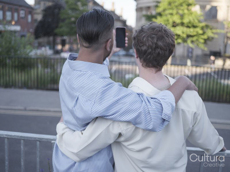 South Yorkshire, Rear view of couple taking selfie outdoors