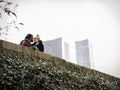 Couple kissing on bridge