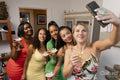 Women taking selfie during party