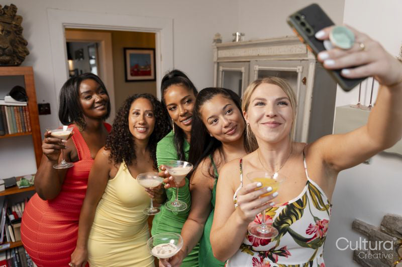 Women taking selfie during party