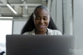 Businesswoman attending video conference in office