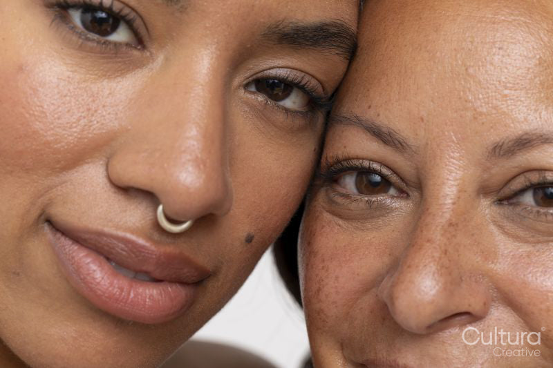 Close-up of two smiling women