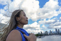 United Kingdom, London, Woman and downtown skyline in background