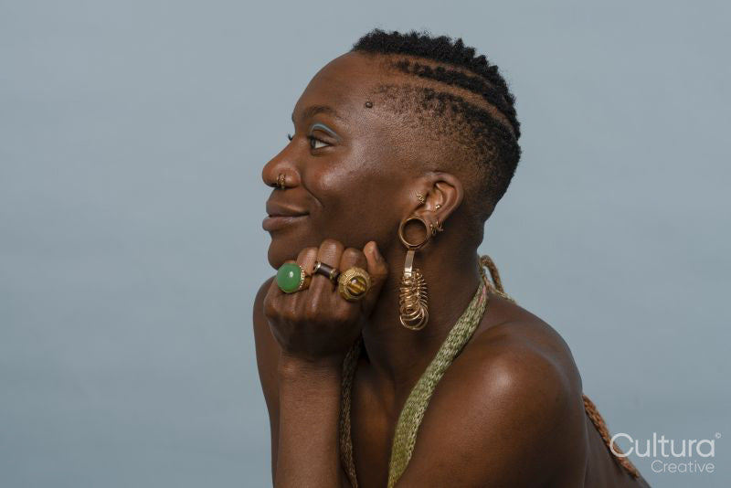 Smiling young woman wearing jewelry