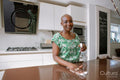 Woman cleaning kitchen counter