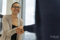 Business people greeting in office