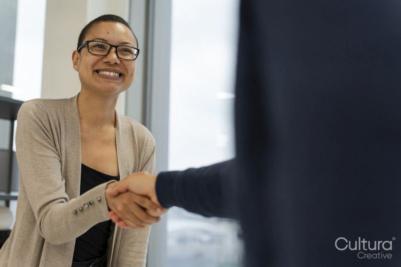 Business people greeting in office