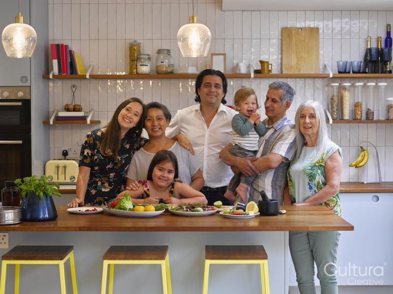 Portrait of smiling family in kitchen