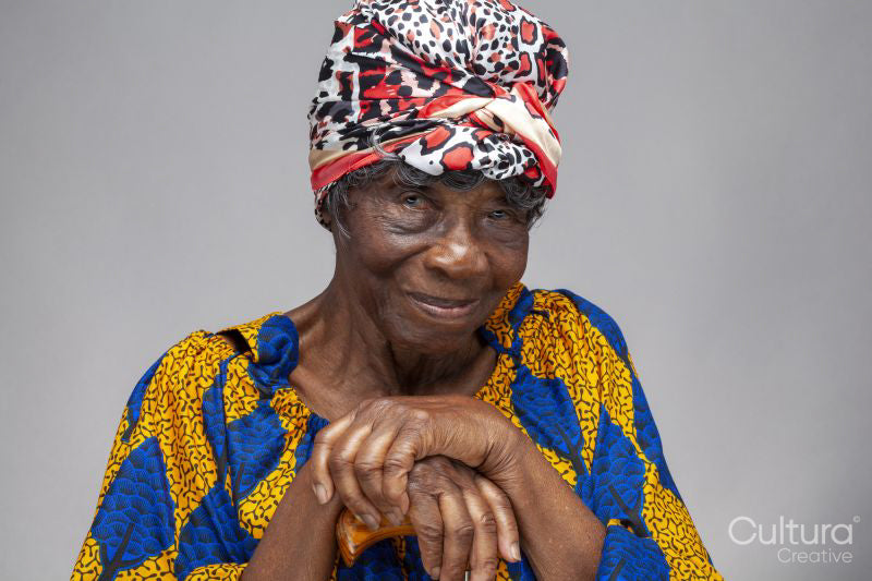 Studio portrait of senior woman wearing headscarf