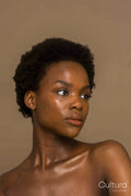 Studio portrait of shirtless woman