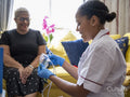 Nurse preparing oxygen mask for patient