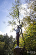 Woman meditating in forest
