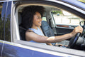 Young woman driving car