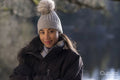 Portrait of smiling young woman in hat