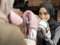 Two women training boxing