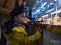 Parents with two sons in self-service restaurant