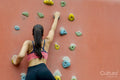 Woman on climbing wall
