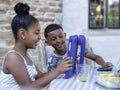 Siblings using digital tablet